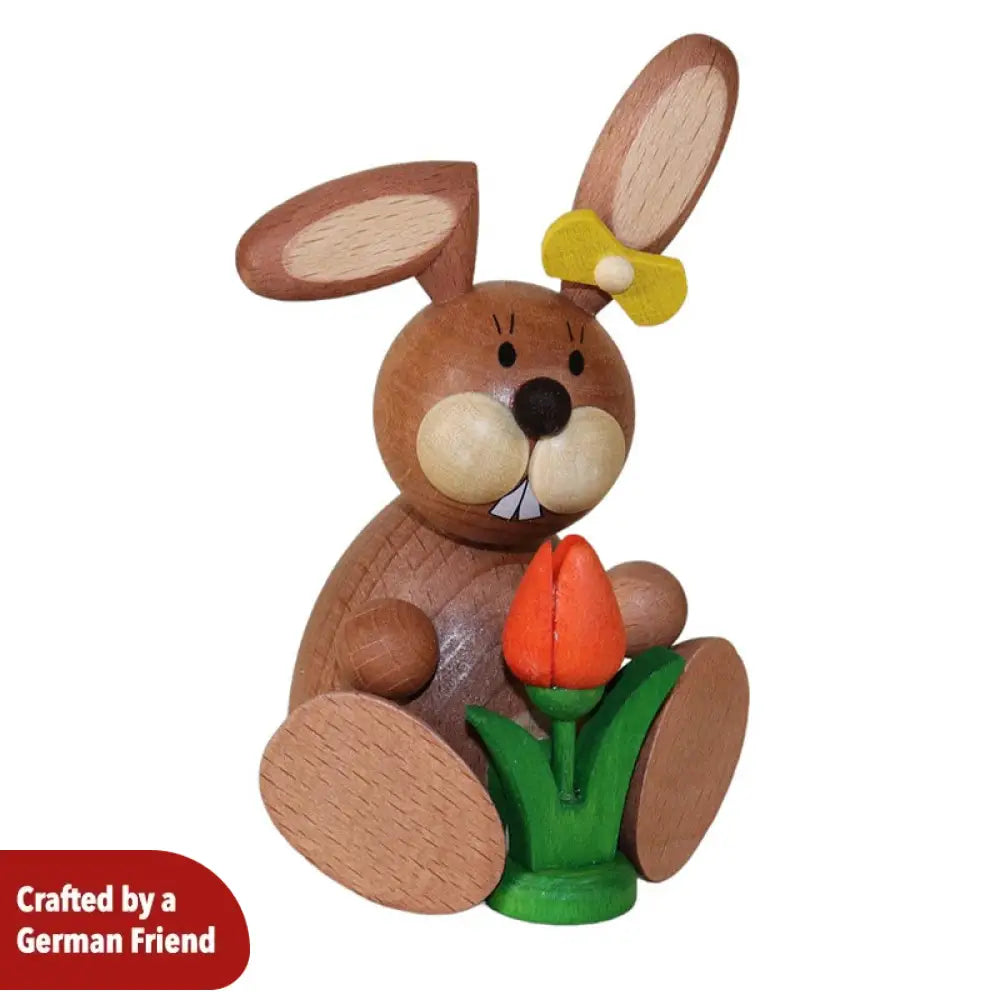 Rabbit woman with a tulip