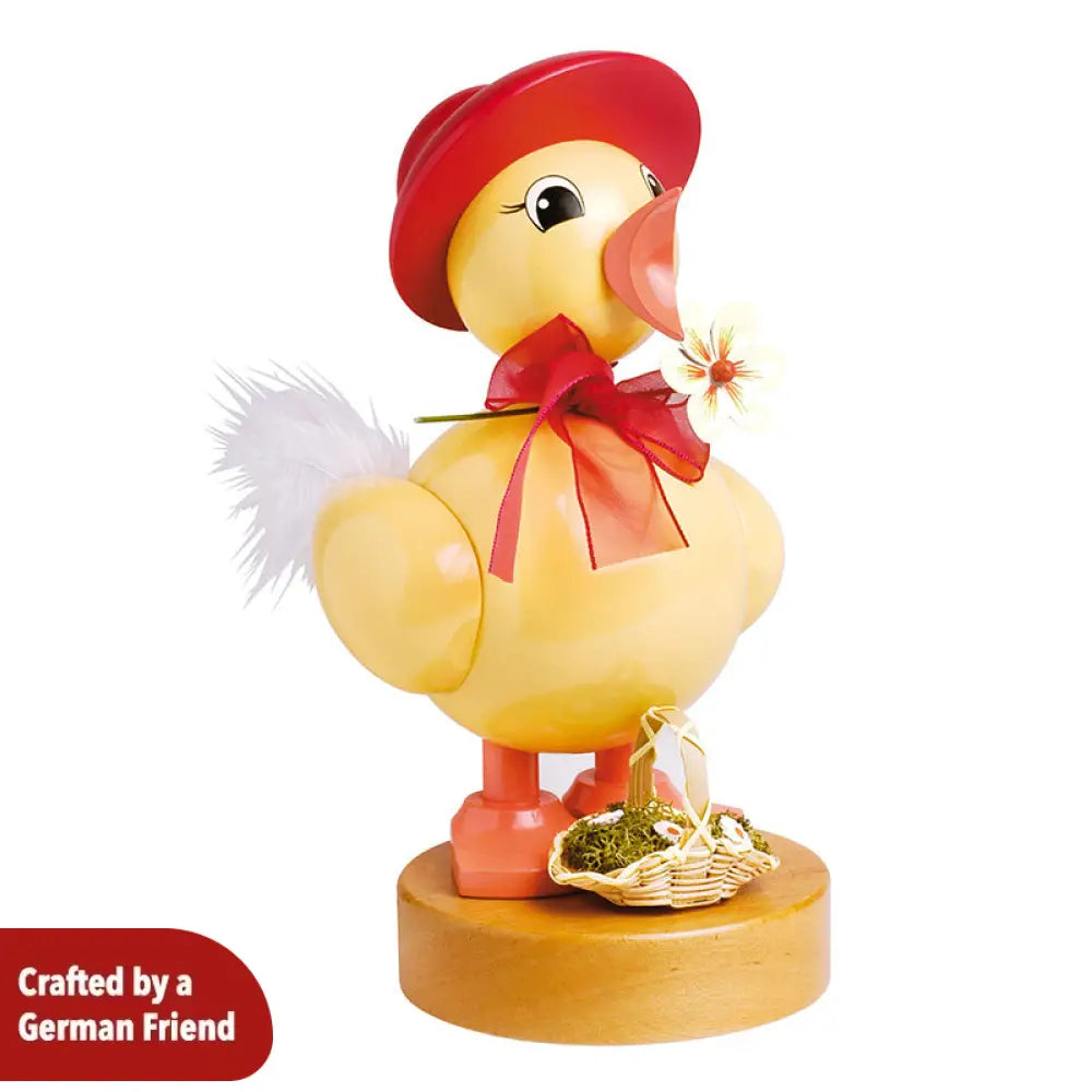 Spring chick with red hat