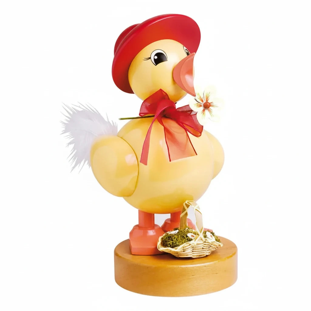 Spring chick with red hat