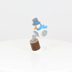 Snowman Otto Chopping Wood