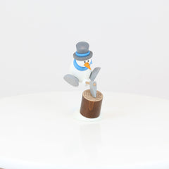 Snowman Otto Chopping Wood