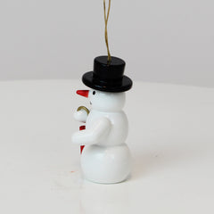Schmuckschnee mit Regenschirm