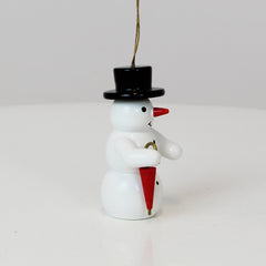 Schmuckschnee mit Regenschirm