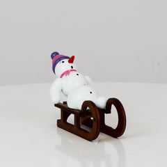 Snowman on Sled