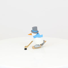 Snowman Otto Playing Ice Hockey
