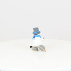 Snowman Otto Playing Ice Hockey