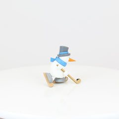 Snowman Otto Playing Ice Hockey