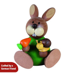 Rabbit with a snail and carrot