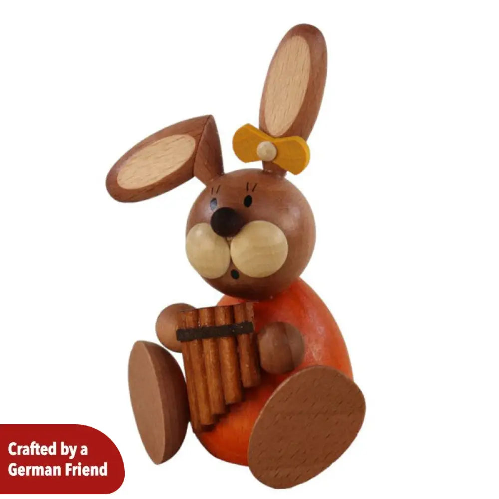 Rabbit woman playing the Pan flute