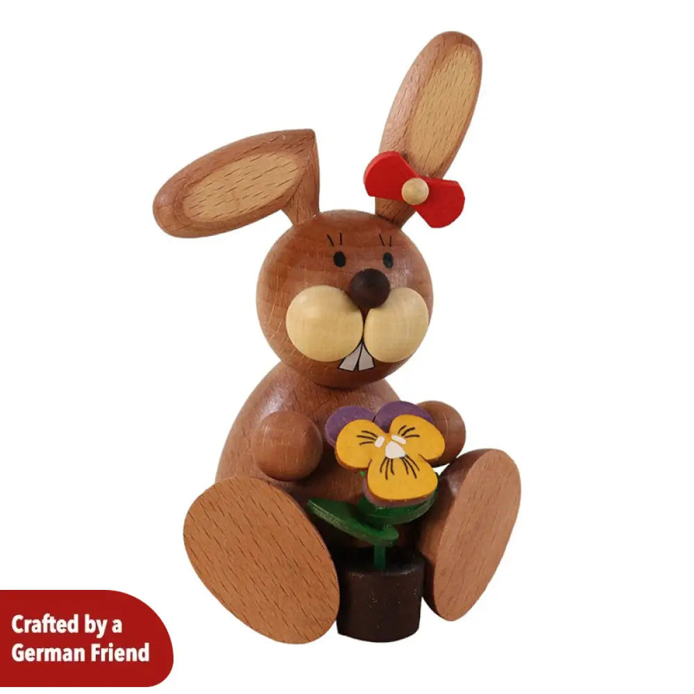 Rabbit woman with a Pansy