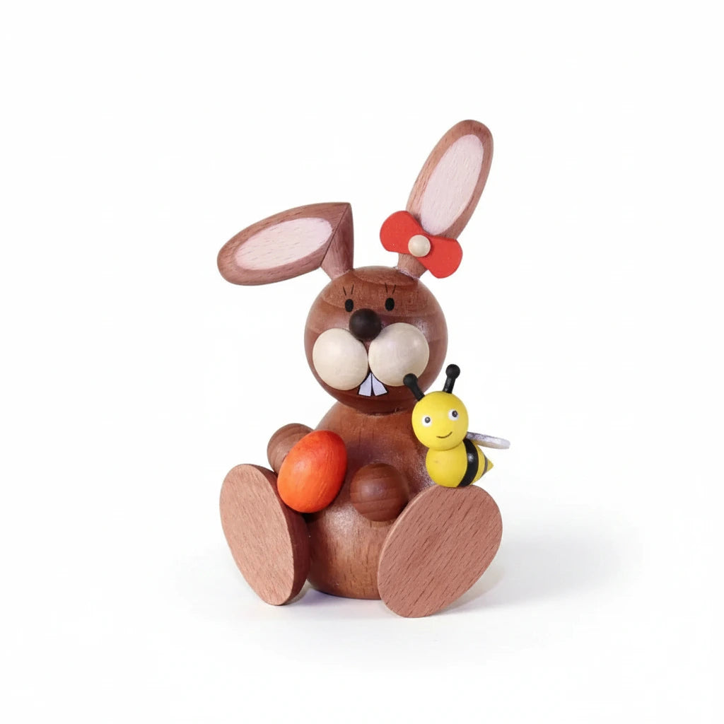 Rabbit woman with an egg and a bee