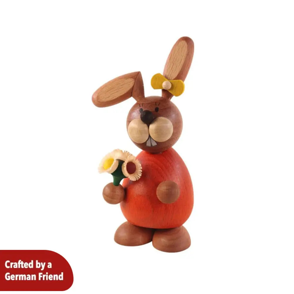 Rabbit woman with bouquet of flowers