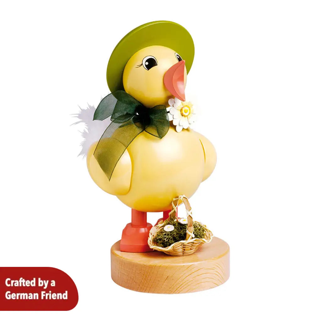 Spring chick with green hat