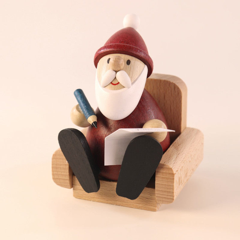 Weihnachtsmann im Sessel